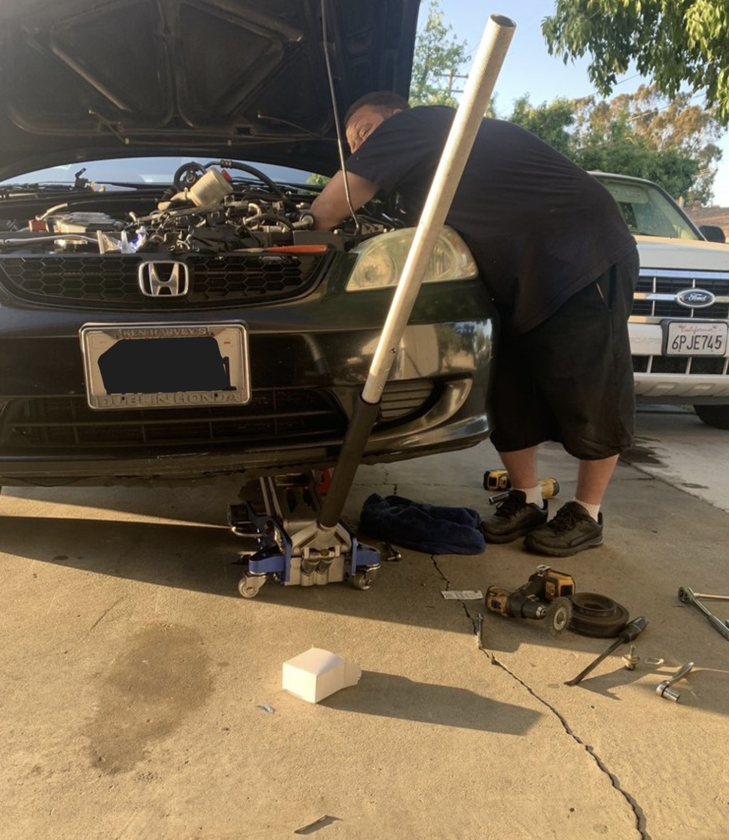 this image shows car mechanic in Pittsburgh, PA